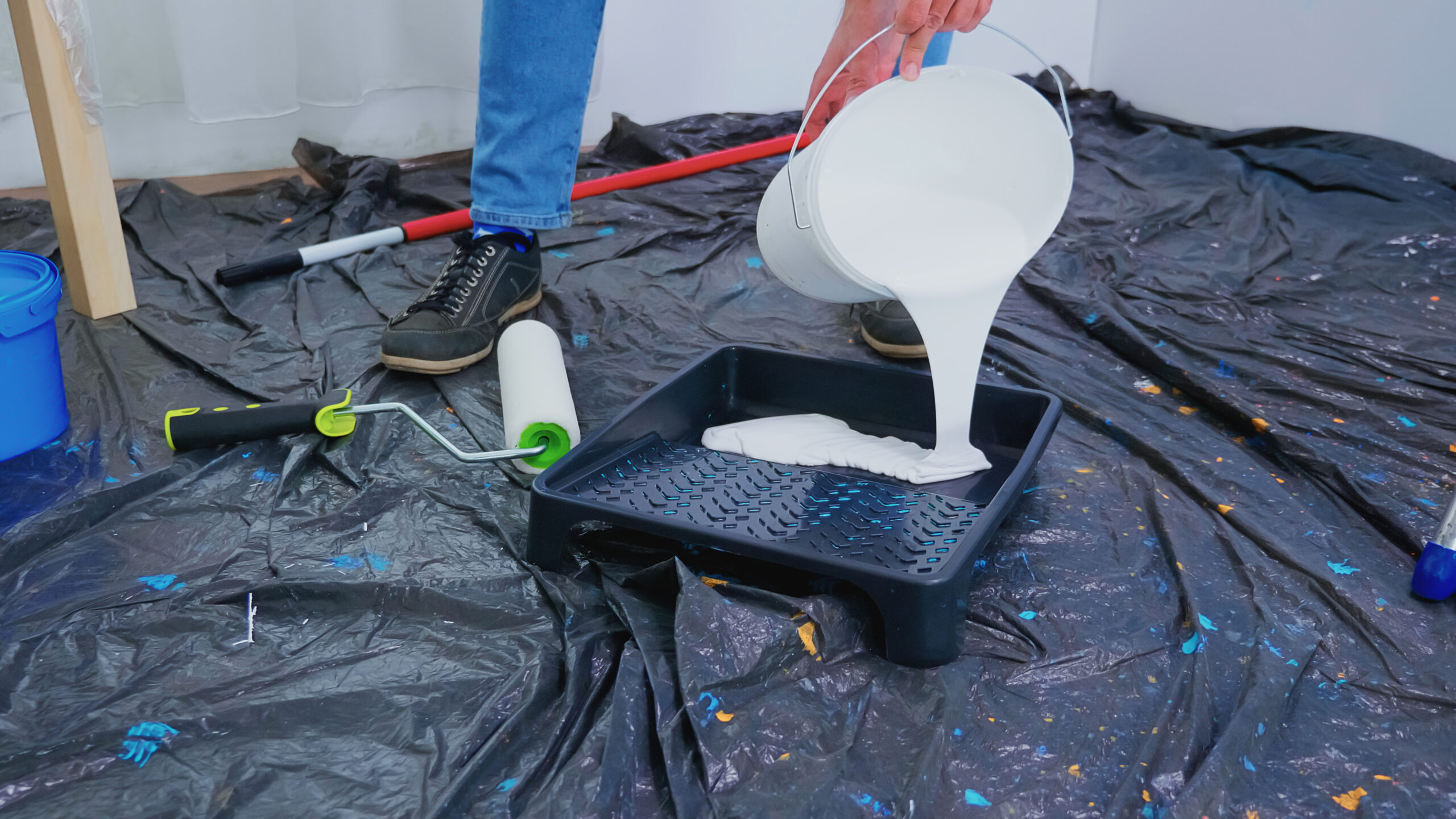 Pouring white paint